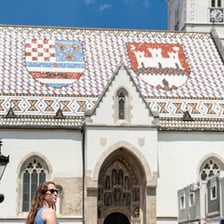 A view of Zagreb, Croatia, featuring the city skyline and St. Mark's Church.