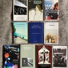 An open book representing a work of novella-length fiction