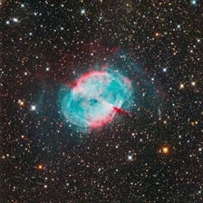 A telescopic image of the Dumbbell Nebula, also known as Messier 27.