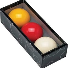 A billiard ball rebounding from the cushion of a pool table