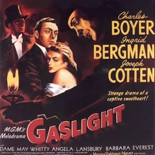 A poster or promotional still from the 1944 film Gaslight featuring Ingrid Bergman and Charles Boyer.