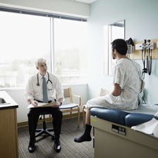 A doctor examining a patient to determine the cause of an illness.