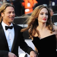 Brad Pitt and Angelina Jolie appearing together at a public event.