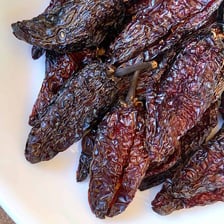 Smoked dried chipotle peppers used as a Mexican cooking ingredient.
