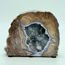 A geode opened to show crystals lining its hollow interior