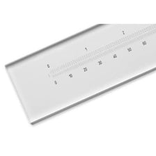 Close-up of evenly spaced gradation marks on a calibrated measuring scale.