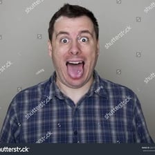 A person showing a surprised expression with their mouth open