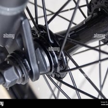 Bicycle spokes extending from the central hub to the wheel rim.