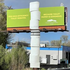 A billboard publicizes a product as part of an advertising campaign.