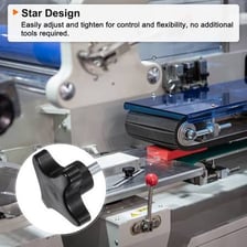 A hand making a small adjustment to a machine control knob