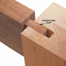 A wooden mortise-and-tenon joint showing the tenon fitted into its mortise