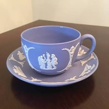 Blue Wedgwood jasperware showing the brand's distinctive classical relief decoration