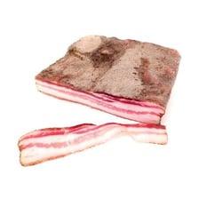 Slices of cured Italian pancetta pork belly