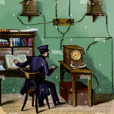 A telegraph operator sending a telegram using vintage communications equipment