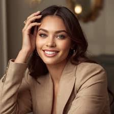 A portrait of a person presented as attractive and stylish.