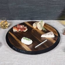 A round rotating serving tray known as a lazy Susan