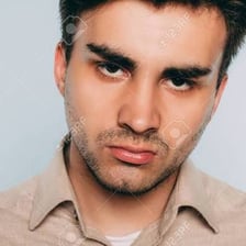 A person displaying a haughty, disdainful expression