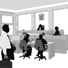 A person representing the plaintiff in a courtroom lawsuit