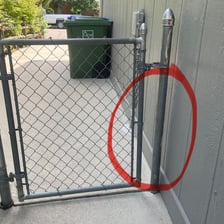 Closed iron gates across an entrance.
