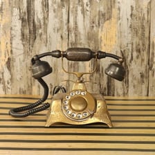 A rotary telephone, an example of technology that has become outmoded.