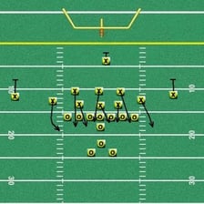 American football defenders rushing toward the quarterback during a blitz.