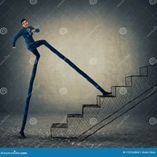 A person walking forward with notably long steps.