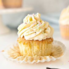 A small cupcake topped with frosting