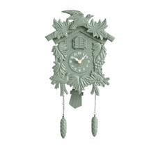 A traditional cuckoo clock with its small bird emerging from the door.