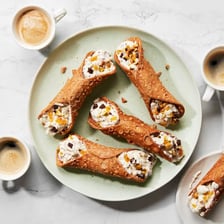 Crisp Italian cannoli pastries filled with sweet ricotta cream