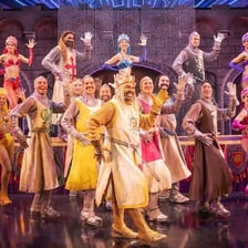 A stage production of the musical Monty Python’s Spamalot