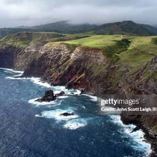 An aerial view of Maui’s Hawaiian coastline and mountainous interior