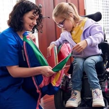 A caregiver attentively looking after a child