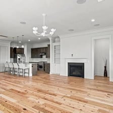 An empty room containing newly placed furniture.