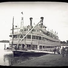 Historic paddlewheel steamboat traveling on the Mississippi River