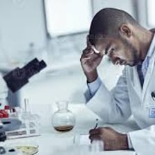 A scientist working on a new technology intended to produce a breakthrough.