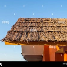 A traditional roof covered with bundled dried grass