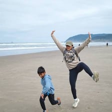 Children playing energetically outdoors in a carefree manner