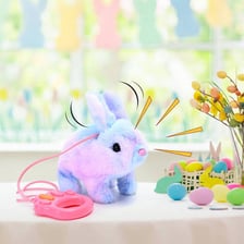 A battery-operated toy bunny shown beside its batteries.