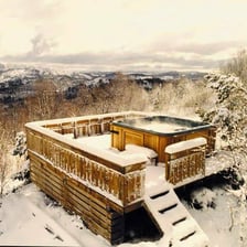 An outdoor spa hot tub filled with warm water.