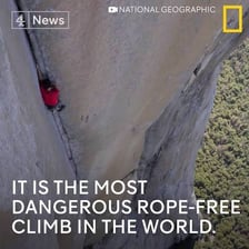A person attempting a dangerous climb without proper safety equipment.