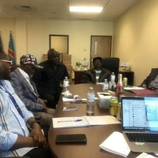 Older community members gathered for a meeting