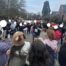 An agitator addressing a crowd and encouraging unrest.