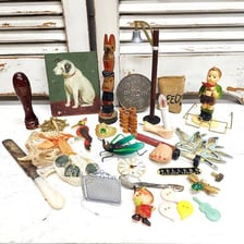 A varied assortment of unrelated small objects gathered together