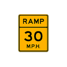A highway exit ramp branching away from the main roadway