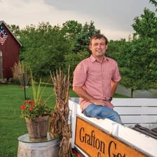A person relaxing at a rural country retreat.