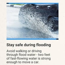 A powerful flood sending a large torrent of water downstream
