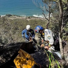 A person dealing with a difficult situation outdoors.
