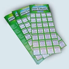 A paper sheet with perforations and a section designed to be torn off.