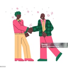 Two people shaking hands to represent a shared agreement.