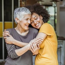 One person encourages a tired friend, who responds with renewed energy.